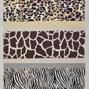 May include: Three fabric swatches with different animal print patterns. The top swatch is a brown and tan leopard print. The middle swatch is a brown and white giraffe print. The bottom swatch is a black and white zebra print.