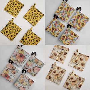 May include: Set of 10 colorful pot holders with various designs.  The designs include sunflowers, pumpkins, and birds.  The pot holders are made of fabric and are heat resistant.