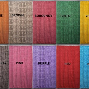 May include: A color chart showing 10 different fabric swatches. The swatches are arranged in two rows of five. The colors are: orange, brown, burgundy, green, yellow, black/gray, pink, purple, red, and blue.