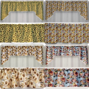 May include: Six different valance designs featuring fall themes. The valances are made of fabric with a variety of patterns, including sunflowers, pumpkins, and leaves. The valances are all in a light color scheme, with shades of yellow, orange, and brown.