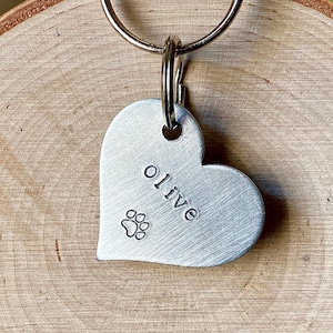 a simple personalized heart dog id tag for collar with name and phone number symbol hand stamped lightweight aluminum 1.25" lost pet cat tag