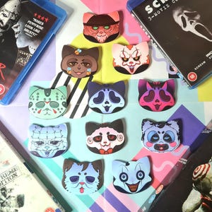 SLASHER KITTIES - emblemas em forma de gato - 53 x 58 mm