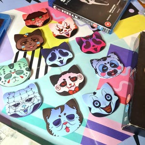 SLASHER KITTIES - cat shaped badges - 53x58mm Any 2