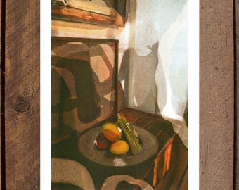 May include: A rectangular art print featuring a still life composition of a dark gray plate holding yellow lemons and green asparagus. The scene is illuminated by soft light casting long shadows, with a framed abstract painting visible in the background.