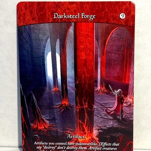 May include: A trading card featuring the "Darksteel Forge" artifact. The card has a red border and depicts a fantasy scene with tall, red-veined pillars and a figure in a red cloak. The card text describes the artifact's indestructible properties.