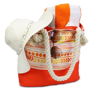 May include: Orange and white striped beach tote bag with rope handles. The bag is filled with a white sun hat, sunglasses, and a white and orange striped towel.