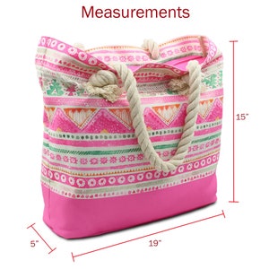 May include: A pink and white canvas tote bag with a geometric pattern and rope handles. The bag measures 19 inches wide, 15 inches tall, and 5 inches deep.