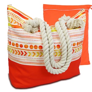 May include: Orange and yellow patterned beach tote bag with thick rope handles. The bag has a separate zippered pouch.