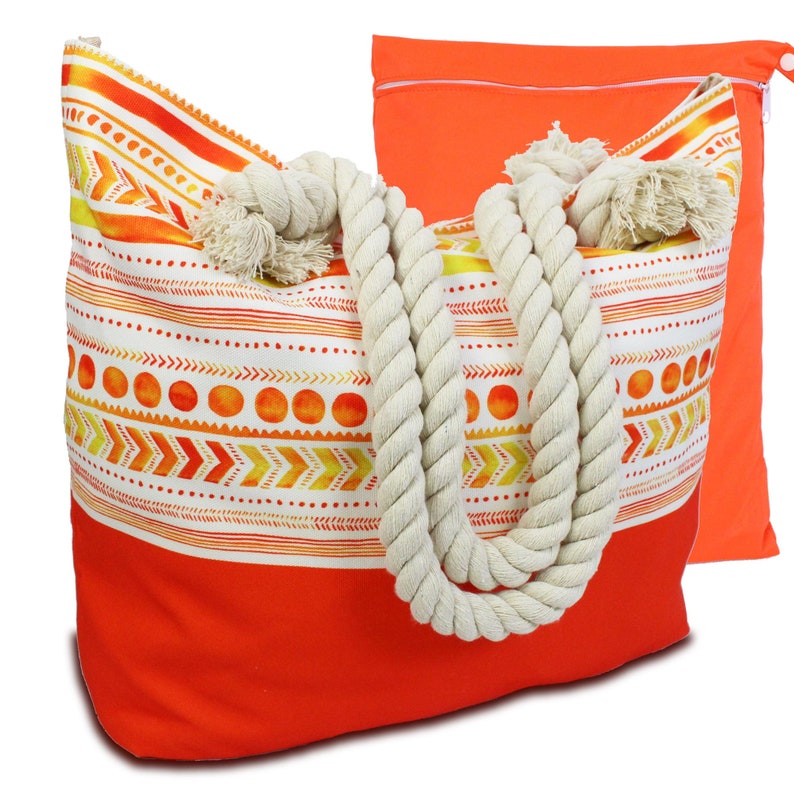 May include: Orange and yellow patterned beach tote bag with thick rope handles. The bag has a separate zippered pouch.