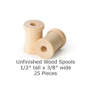 May include: Unfinished wood spools, 25 pieces, 1/2 inch tall by 3/8 inch wide.
