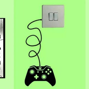 May include: A graphic design showing a light switch connected to a games controller by a black cable. The background is light green. The text "splashlight-art" is on the left side of the image.
