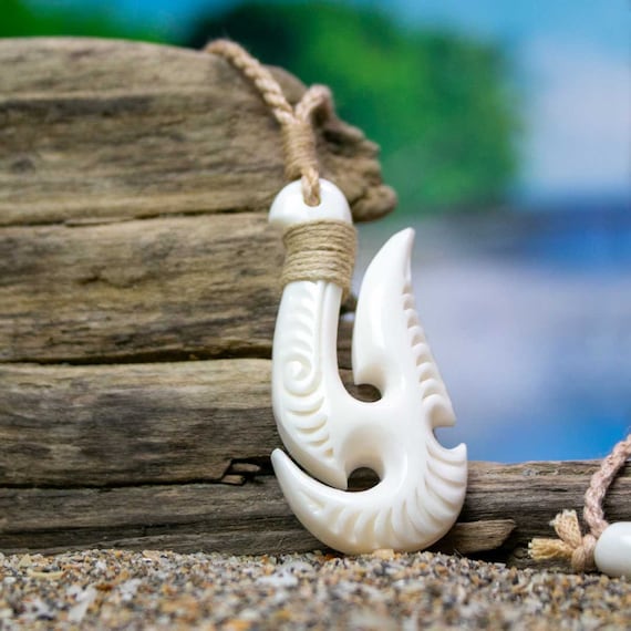 Hand outlet carved necklaces