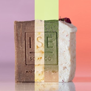 May include: Three bars of soap with the text "ISE SOAP CO. MADE IN THE USA" on the front. The bars are brown, green, and white.