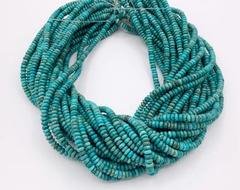 May include: A bundle of turquoise-colored, small, round beads. The beads are strung together, forming multiple strands. The beads have a slightly irregular shape and a matte finish. The color varies from light to dark turquoise.