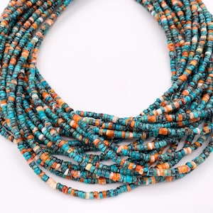 May include: A multi-strand necklace composed of small, turquoise, orange, and white beads. The beads are strung together, creating a layered effect. The necklace is displayed against a white background.