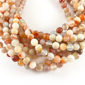 Bracciale Elasticizzato Unisex In Sardonyx 6mm: Portafortuna, Meditazione E Prosperità - 7 Pollici