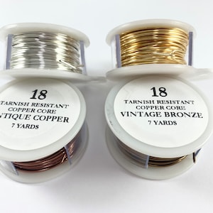 May include: Two spools of 18 gauge tarnish resistant copper core wire. One spool is antique copper and the other is vintage bronze. Each spool contains 7 yards of wire.