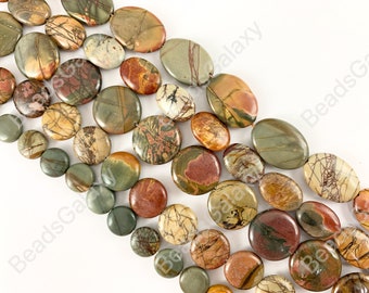 May include: A strand of oval and round, natural, polished, green, brown, and red jasper beads. The beads are arranged in a staggered pattern, with the oval beads on top of the round beads.