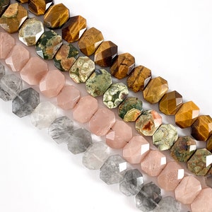 May include: A strand of faceted gemstone beads in various colors, including brown, green, and pink. The beads are strung on a clear thread and are ready to be used for jewelry making.