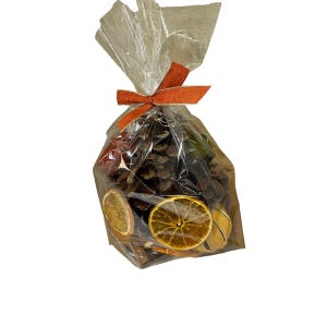 May include: A clear plastic bag filled with dried orange slices, cinnamon sticks, and pine cones, tied with a red ribbon.