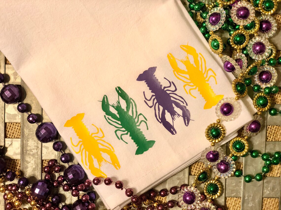 crawfish sack of mardi gras beads