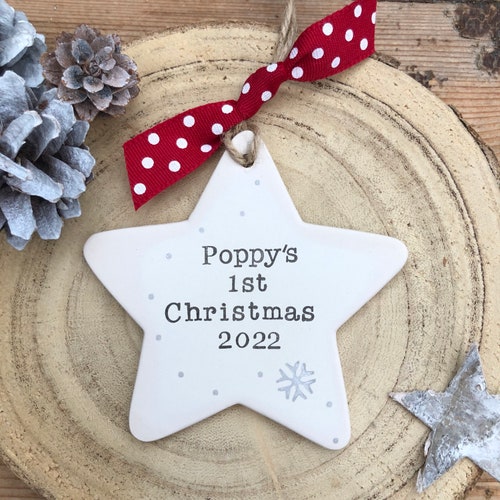 Personalised baby's first Christmas 2024 | ceramic star bauble | hand stamped | first tree decoration | keepsake | 1st Christmas ornament