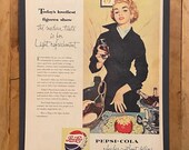 Framed 1953 Pepsi-Cola Loveliest Figure advertisement