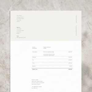 May include: A white invoice with black text. The invoice number is #0003442 and the project reference is A3468. The invoice lists a description of "Brand and website design" with a cost of £820.00. The subtotal is £820.00, the tax is £54.00, and the total is £884.00. The balance due is £884.00.