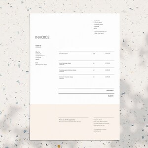 May include: A simple invoice template with the title "Invoice" at the top. The invoice is for a company called "AnyDes" and lists the services provided, the quantity, unit cost, and total amount due. The invoice number is 48543 and the date is September 20, 2019.