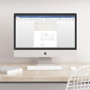 K&ouml;nnte beinhalten: Ein Computerbildschirm zeigt ein leeres Word-Dokument mit dem Titel "A4 Invoice" und dem Text "AaBbI" in der oberen rechten Ecke.