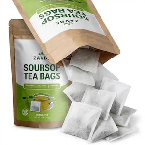 May include: A brown paper bag and a white bag of soursop tea bags. The bag has the text "ZAVB SOURSOP TEA BAGS" in green and white. The tea bags are falling out of the bag. The image also shows a cup of tea.