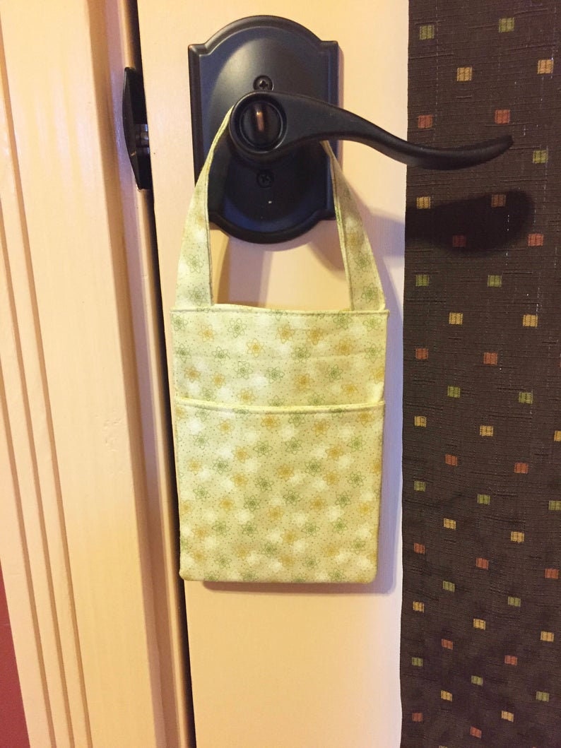 Light Green Leaves or Foliage with Metalic Flowers Pocket Door Knob Pouch with a Hanging Loop Cell Phone Charging Pocket