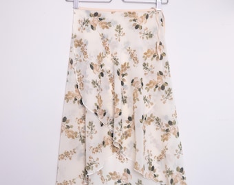 Falda cruzada de gasa floral color blanco roto para ballet – Prenda para ensayos y clases de ballet