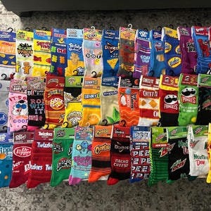 Novelty socks. Candy, soda, food, chips, cereal, bakery. Secret Santa gift