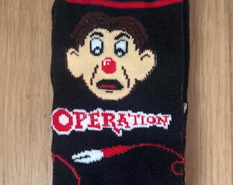 Novelty socks. Medical doctor surgeon socks operation game. Medical school healthcare