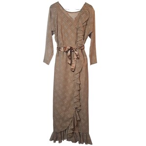 May include: A long, tan dress with a V-neckline and long sleeves. The dress features a ruffled front and a matching tie belt. The fabric has a subtle, repeating pattern of curved white lines.
