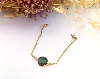 Gold color bracelet with green baby breath pressed flower is a perfect gift for her