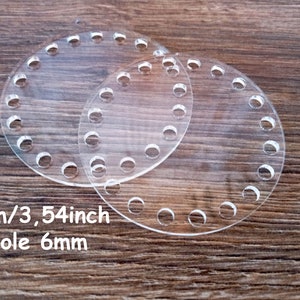 May include: Two clear plastic circular discs with multiple holes. Each disc is 9cm/3.54 inches in diameter with 6mm holes.