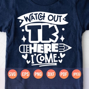 May include: A navy blue t-shirt with white text that reads "Watch Out TK Here I Come" with a pencil graphic and hearts. The text is in a playful, handwritten font.