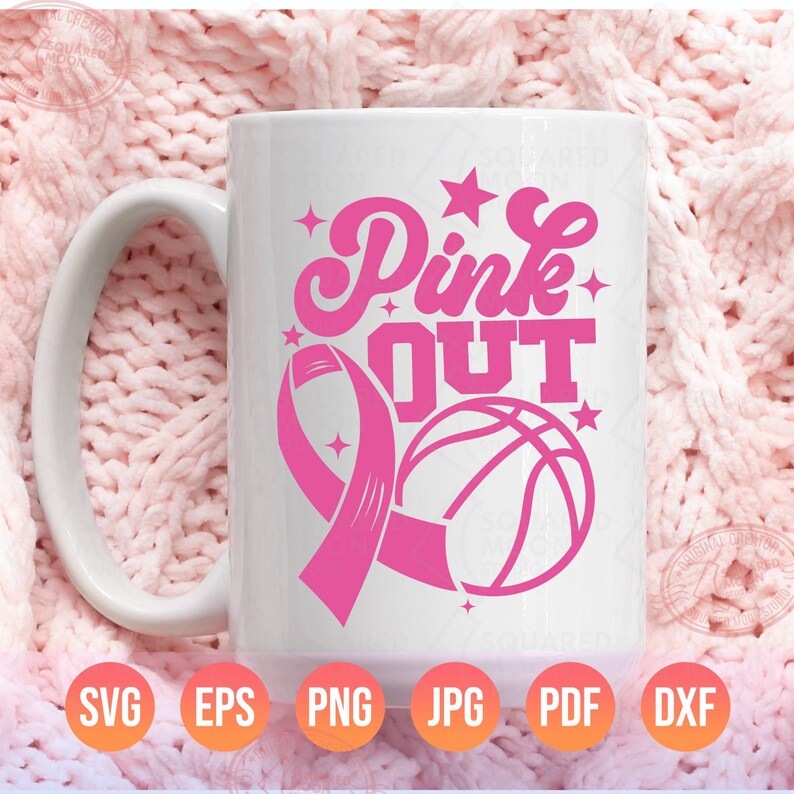 May include: White ceramic mug with a pink ribbon, basketball, and the text "Pink Out" in a pink retro font.