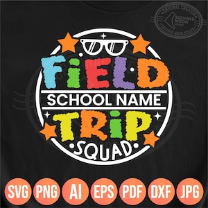May include: Black t-shirt with a colorful graphic design. The design features the words "FIELD TRIP SQUAD" in a circular arrangement, with the text "SCHOOL NAME" in the center. The design includes stars and sunglasses.