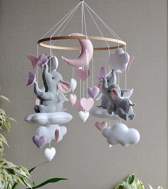 Pink elephant cot mobile sale