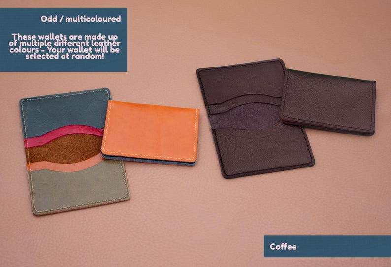 May include: Four leather wallets in different colors and styles. The wallets are arranged on a light brown surface. The text "Odd/multicoloured" and "These wallets are made up of multiple different leather colours - Your wallet will be selected at random!" is visible at the top of the image. The text "Coffee" is visible at the bottom of the image.