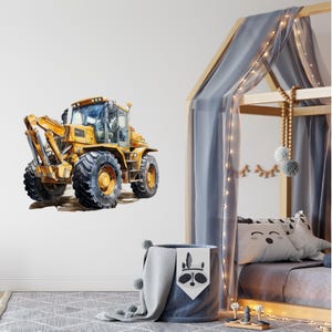 May include: Watercolor illustration of a yellow construction vehicle with large black tires. The heavy equipment is set against a white background. The image is a wall decal, suitable for a child's room.
