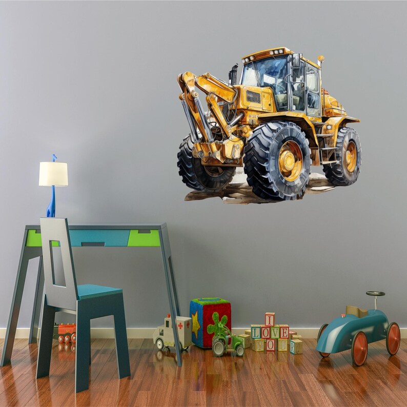 May include: A large, yellow construction vehicle with black tires is depicted on a gray wall. The vehicle has a detailed design, with visible windows and mechanical arms. The image is a watercolor-style illustration, suitable for children's room decor.