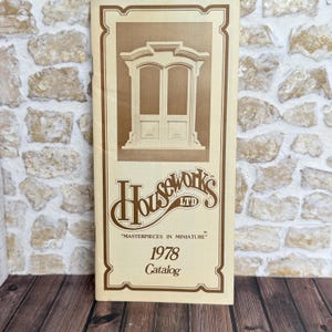 May include: A vintage catalog from Houseworks LTD, featuring a detailed illustration of a miniature door. The catalog is in shades of brown and cream, with the text "MASTERPIECES IN MINIATURE" and "1978 Catalog".