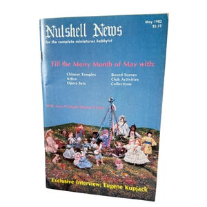 May include: A May 1982 issue of Nutshell News magazine for the complete miniatures hobbyist. The blue cover features a maypole surrounded by numerous miniature dolls on a grassy surface, with text listing contents like Chinese Temples and Attics.