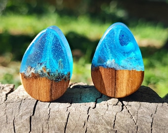 Paar druppelvormige oordopjes: oceaanblauwe dubbele flare-meters, (ong. 2 inch)