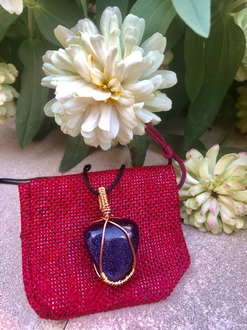 Blue goldstone wire wrapped pendant