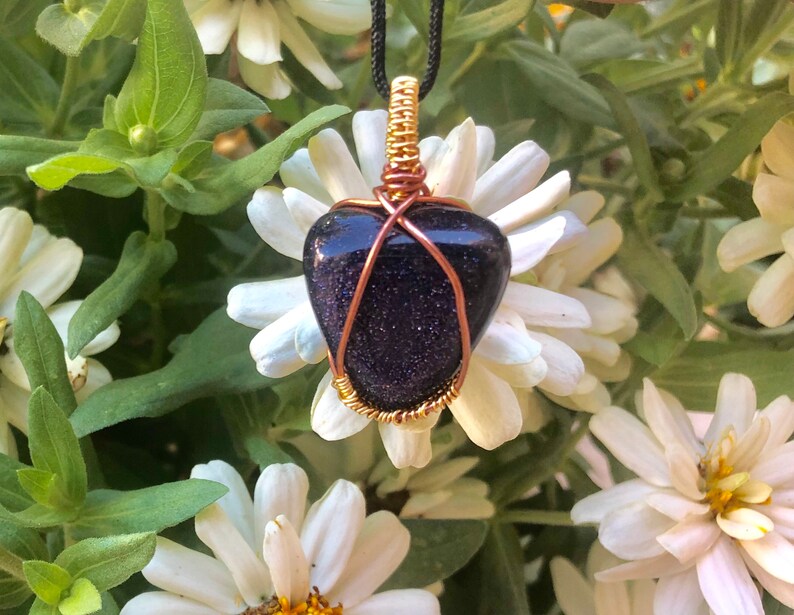 Blue goldstone wire wrapped pendant